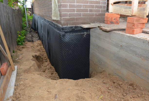 SJ Waterproofing Pros technician performing targeted Exterior Waterproofing assessment in Beaver Dam, KY